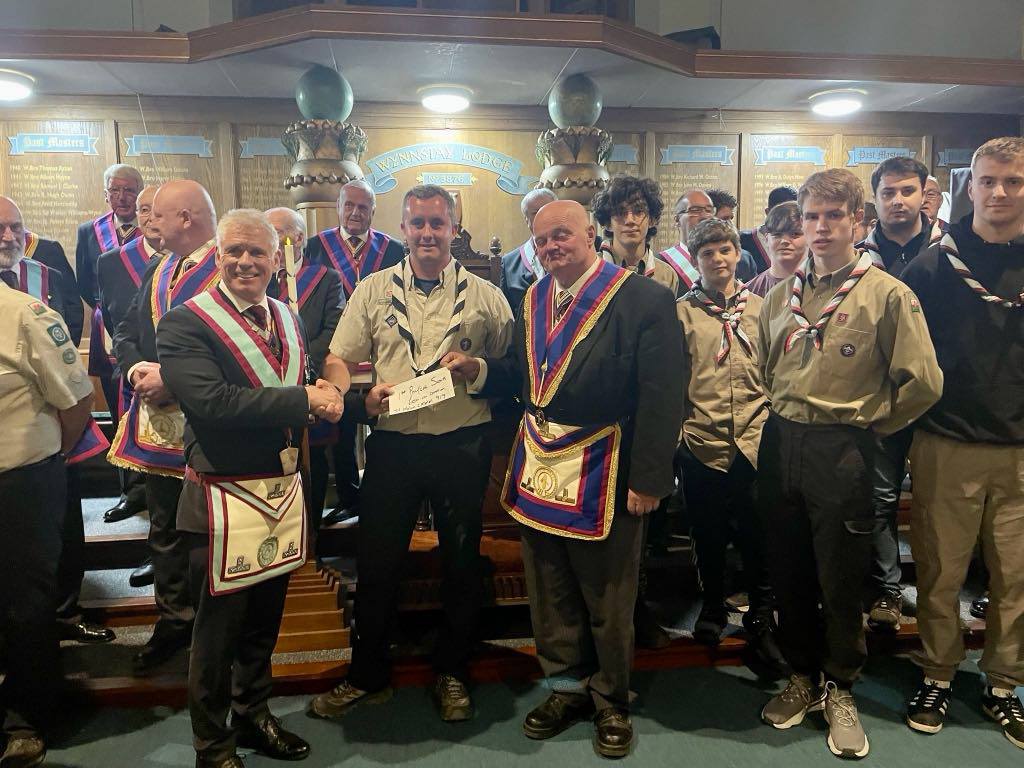 St Mabon receives delegation from 1st Penycae Scout Group